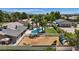 Home featuring a pool, horse property with horses, RV parking, desert landscaping, and mature trees at 7675 Butterscotch Ct, Las Vegas, NV 89131