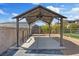 Covered shelter area with concrete base for vehicles or equipment; functional and spacious at 7675 Butterscotch Ct, Las Vegas, NV 89131