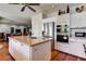 Well-appointed kitchen features stainless appliances, painted cabinets, and a functional island at 7889 Rancho Mirage Dr, Las Vegas, NV 89113