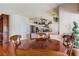 Eat-in kitchen featuring a wooden table and chairs, bright lighting, and modern appliances at 7889 Rancho Mirage Dr, Las Vegas, NV 89113