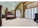 Large bedroom with custom window coverings, recessed lights, and carpet at 7889 Rancho Mirage Dr, Las Vegas, NV 89113