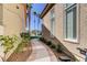Side yard featuring a walkway leading to a pool at 7889 Rancho Mirage Dr, Las Vegas, NV 89113