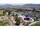 Aerial shot showcasing the community park featuring a playground, basketball court, and scenic picnic spots at 9052 Pine Mission Ave, Las Vegas, NV 89143