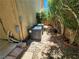 Exterior of the home featuring the AC units alongside a walkway and landscaped foliage at 9052 Pine Mission Ave, Las Vegas, NV 89143