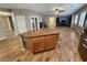 Kitchen featuring central island with breakfast bar and view of the living room at 9052 Pine Mission Ave, Las Vegas, NV 89143