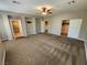 Expansive primary bedroom with ceiling fan and adjoining closet and bathroom at 9052 Pine Mission Ave, Las Vegas, NV 89143