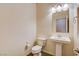 Powder bathroom featuring a pedestal sink and tile floors at 907 Gallery Course Dr, Las Vegas, NV 89148