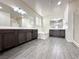 Spacious primary bathroom features double vanities, soaking tub, and a walk-in shower at 907 Gallery Course Dr, Las Vegas, NV 89148