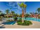 Inviting hot tub near a community pool, featuring lush landscaping and ample space for relaxation at 907 Gallery Course Dr, Las Vegas, NV 89148
