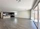 Spacious living room features a large sliding glass door with access to the backyard at 907 Gallery Course Dr, Las Vegas, NV 89148