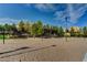 Sandy beach volleyball court in a community, perfect for outdoor sports and recreation at 907 Gallery Course Dr, Las Vegas, NV 89148