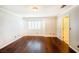 Bedroom with hardwood floors and natural light offers a comfortable and inviting space at 9155 Harvest Homes St, Las Vegas, NV 89123