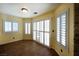 Bright dining area with tile flooring, plantation shutters, and ample natural light at 9155 Harvest Homes St, Las Vegas, NV 89123