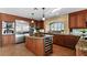 Gourmet kitchen featuring custom cabinets, granite countertops, and stainless steel appliances at 9155 Harvest Homes St, Las Vegas, NV 89123