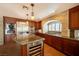 Well-appointed kitchen with stainless steel appliances, granite counters, and plenty of cabinet space at 9155 Harvest Homes St, Las Vegas, NV 89123