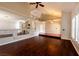 Open-concept living area with beautiful hardwood floors and natural light at 9155 Harvest Homes St, Las Vegas, NV 89123
