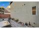 Backyard with paver patio and views of the home at 9715 Aleutian St, Las Vegas, NV 89178