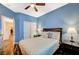 Cozy bedroom featuring a queen bed, dark furniture, and closet storage space at 9715 Aleutian St, Las Vegas, NV 89178