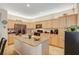 Modern kitchen with granite countertops, ample cabinet space, and stainless steel appliances at 9715 Aleutian St, Las Vegas, NV 89178