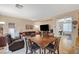 Well-lit living space featuring an open floor plan with a view into additional rooms at 9715 Aleutian St, Las Vegas, NV 89178