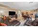 Open floor plan with living room and kitchen, seamlessly connected for modern living at 9715 Aleutian St, Las Vegas, NV 89178
