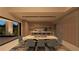 An open-concept dining room with a kitchen island and floor to ceiling windows at 120 Still Shores St, Henderson, NV 89011