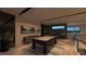 Stylish game room with a pool table and modern decor, illuminated by sleek lighting at 120 Still Shores St, Henderson, NV 89011