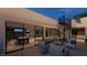A spacious rooftop patio with comfortable seating, a spiral staircase, and views at 120 Still Shores St, Henderson, NV 89011