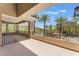 Spacious outdoor balcony with rod iron railing, pillars and outdoor lighting at 128 Los Cabos Dr # 202, Las Vegas, NV 89144