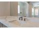Close up of the bathroom with stone counters and contemporary faucet at 128 Los Cabos Dr # 202, Las Vegas, NV 89144
