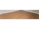 Close up on new light hardwood floors and modern baseboards at 128 Los Cabos Dr # 202, Las Vegas, NV 89144