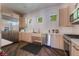 Modern kitchen with stainless steel appliances, white countertops and an accessible sink at 128 Los Cabos Dr # 202, Las Vegas, NV 89144