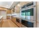 Beautiful kitchen featuring stainless steel appliances, quartz countertops, and a white subway tile backsplash at 128 Los Cabos Dr # 202, Las Vegas, NV 89144