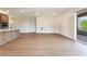 Open living space with hardwood floors and views of the outside at 128 Los Cabos Dr # 202, Las Vegas, NV 89144