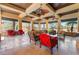 Relaxing outdoor living area with comfortable seating and stylish ceiling fans at 128 Los Cabos Dr # 202, Las Vegas, NV 89144