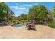 Community spa with a table and chairs to enjoy the outdoors at 128 Los Cabos Dr # 202, Las Vegas, NV 89144