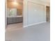 Bathroom featuring double vanity with gray cabinets and tile flooring at 128 Los Cabos Dr # 302, Las Vegas, NV 89144