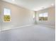 Bright bedroom with soft carpet and scenic views from multiple windows at 128 Los Cabos Dr # 302, Las Vegas, NV 89144