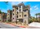 Contemporary building with stylish architecture and well-manicured landscaping at 128 Los Cabos Dr # 302, Las Vegas, NV 89144