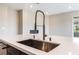 Close-up of stainless steel sink and modern faucet in island at 128 Los Cabos Dr # 302, Las Vegas, NV 89144