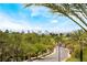 Landscaped with golf course and city skyline in the distance at 128 Los Cabos Dr # 302, Las Vegas, NV 89144