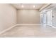 Spacious living room featuring light tile flooring and neutral wall colors at 128 Los Cabos Dr # 302, Las Vegas, NV 89144