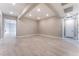 Neutral living room with tile floors, recessed lighting, and large open space at 128 Los Cabos Dr # 302, Las Vegas, NV 89144
