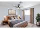 Bright bedroom featuring a large bed, stylish decor, and natural light at 1700 Ivanhoe Way, Las Vegas, NV 89102