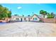 Charming single-story home featuring a spacious driveway and well-maintained landscaping, perfect for suburban living at 1700 Ivanhoe Way, Las Vegas, NV 89102