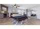 Cozy main bedroom featuring a wooden bed frame, fireplace, and mirrored closet doors, creating a relaxing retreat at 1700 Ivanhoe Way, Las Vegas, NV 89102