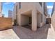 Backyard featuring brick pavers and gravel, providing a versatile outdoor space at 1801 Flycatch St, Las Vegas, NV 89138