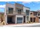 Contemporary two-story home with a balcony and a two-car garage at 1801 Flycatch St, Las Vegas, NV 89138