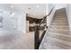 Open floor plan featuring stairs, neutral carpet, and a modern kitchen at 1801 Flycatch St, Las Vegas, NV 89138