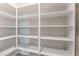 Spacious walk-in pantry with multiple shelves for ample storage at 1801 Flycatch St, Las Vegas, NV 89138
